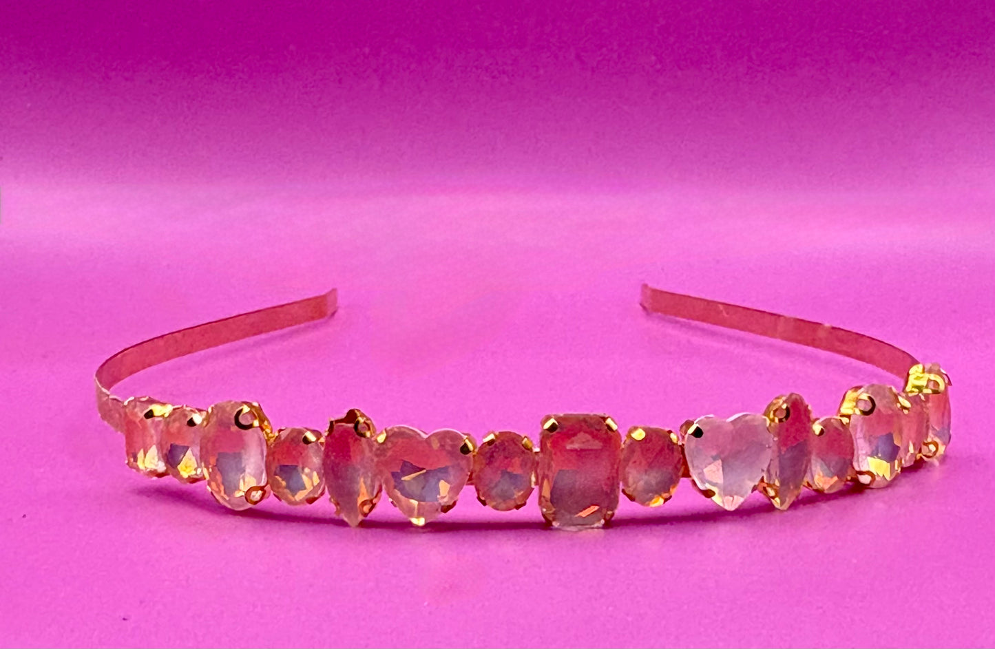 Elegant hand-decorated neon pastel headband featuring sparkling glass rhinestones, perfect for adding a touch of glamour to evening wear and special occasions.