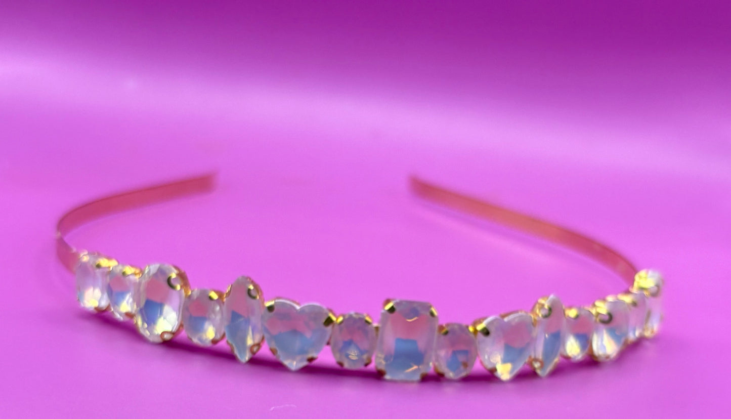 Elegant hand-decorated neon pastel headband featuring sparkling glass rhinestones, perfect for adding a touch of glamour to evening wear and special occasions.