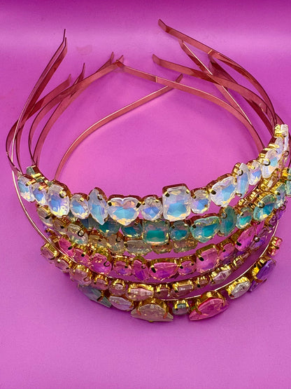 Elegant hand-decorated neon pastel headband featuring sparkling glass rhinestones, perfect for adding a touch of glamour to evening wear and special occasions.