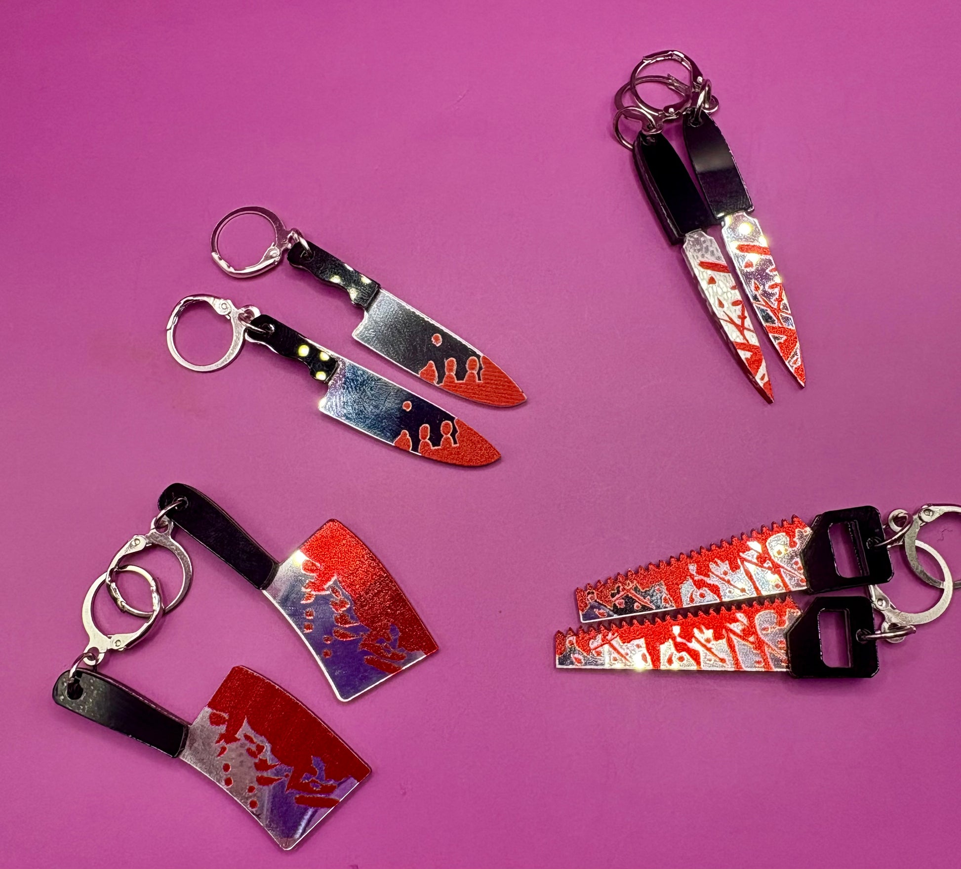 Spooky Halloween Earrings Featuring Realistic Fake Knives and Axes with Blood Detail - Scary Horror Accessories Inspired by Thriller Movies - Perfect for Halloween Costumes and Decorations