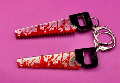 Spooky Halloween Earrings Featuring Realistic Fake Knives and Axes with Blood Detail - Scary Horror Accessories Inspired by Thriller Movies - Perfect for Halloween Costumes and Decorations