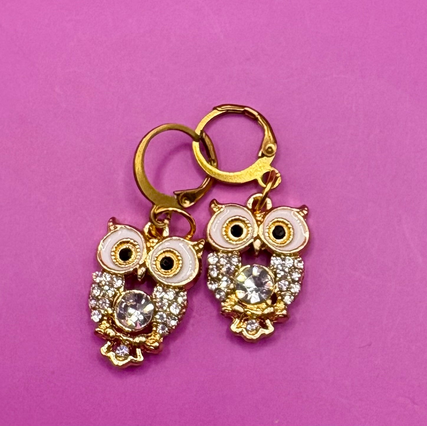 Adorable gold diamante owl earrings featuring sparkling embellishments, perfect for adding a whimsical touch to your jewelry collection and enhancing any outfit.