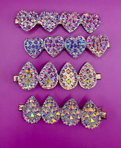 Stylish large circular heart teardrop glitter hair slide in silver, ideal for adding sparkle to festive hairstyles, sold in pairs, perfect for Christmas celebrations.