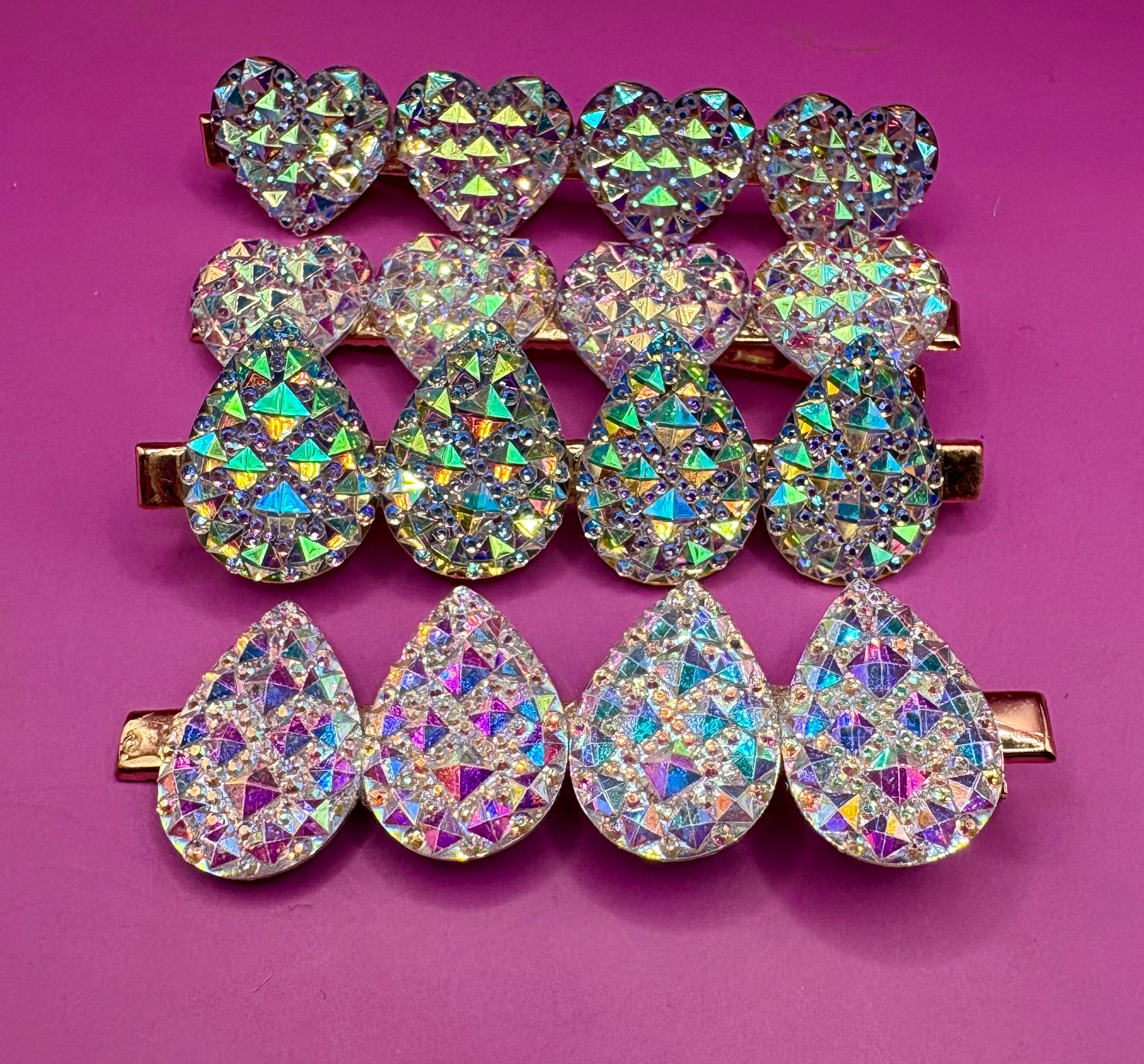 Stylish large circular heart teardrop glitter hair slide in silver, ideal for adding sparkle to festive hairstyles, sold in pairs, perfect for Christmas celebrations.