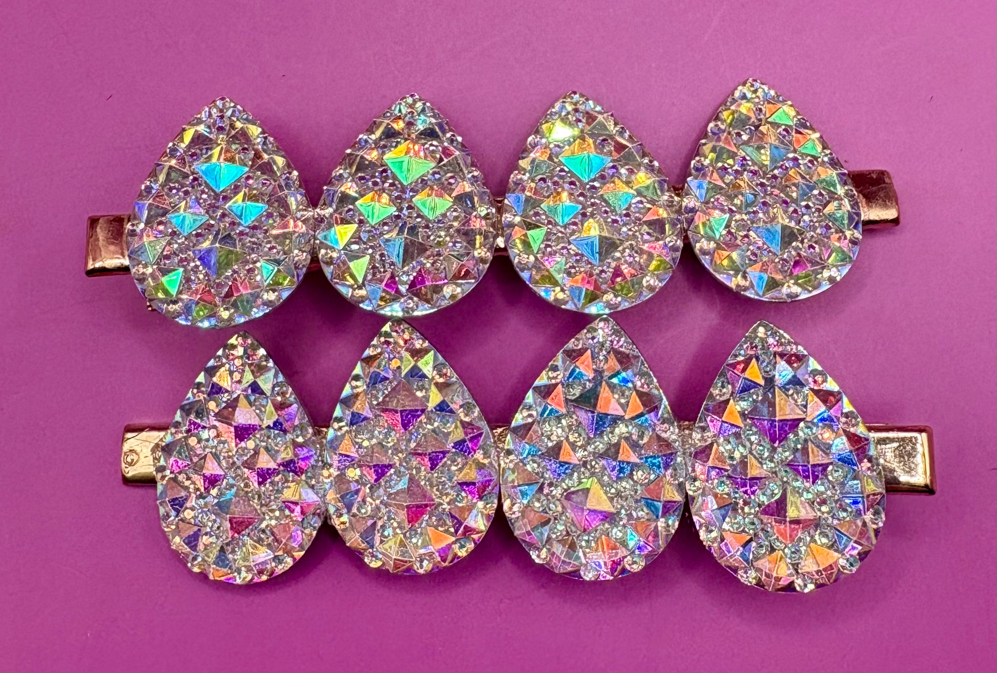 Stylish large circular heart teardrop glitter hair slide in silver, ideal for adding sparkle to festive hairstyles, sold in pairs, perfect for Christmas celebrations.