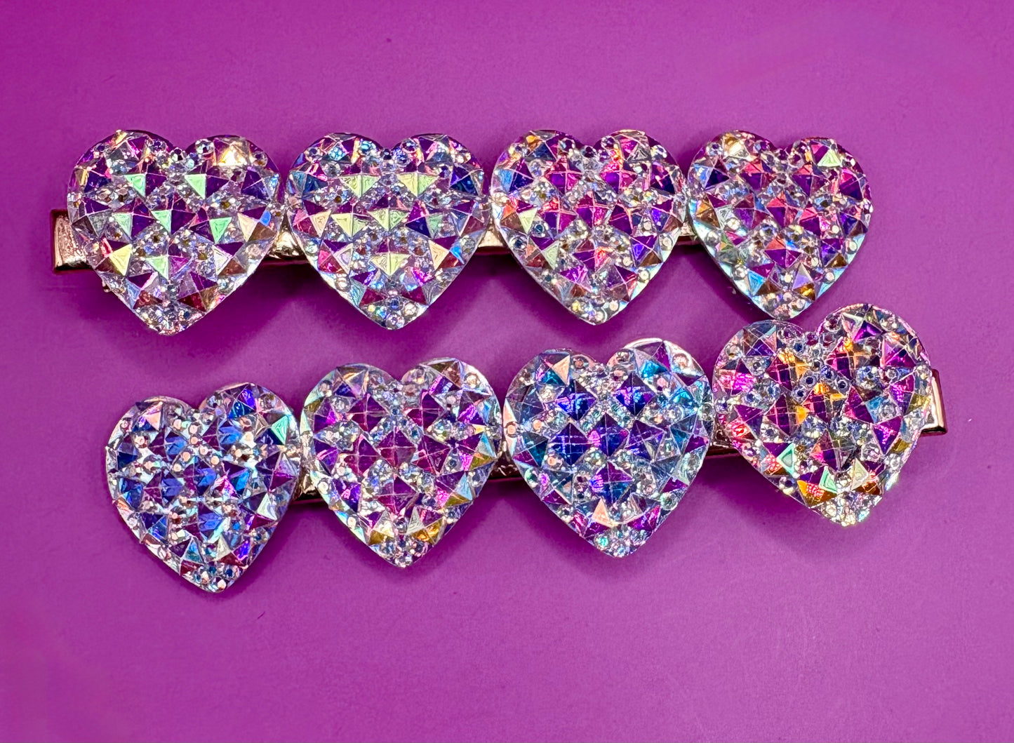 Stylish large circular heart teardrop glitter hair slide in silver, ideal for adding sparkle to festive hairstyles, sold in pairs, perfect for Christmas celebrations.
