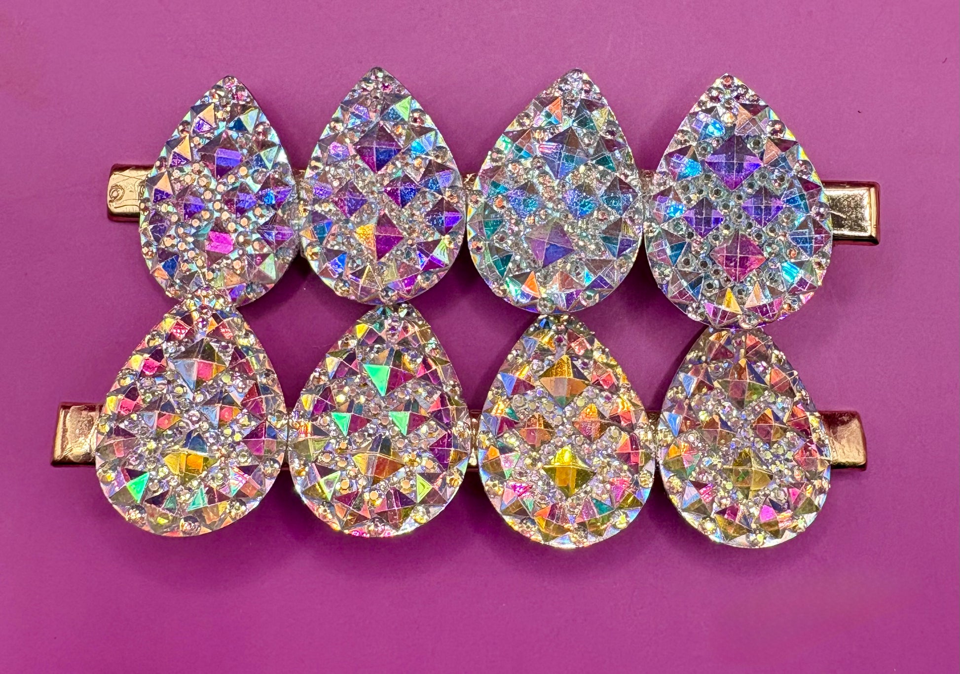 Stylish large circular heart teardrop glitter hair slide in silver, ideal for adding sparkle to festive hairstyles, sold in pairs, perfect for Christmas celebrations.