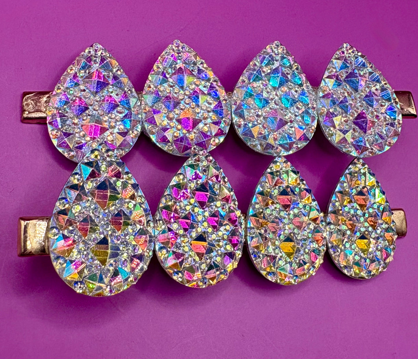 Stylish large circular heart teardrop glitter hair slide in silver, ideal for adding sparkle to festive hairstyles, sold in pairs, perfect for Christmas celebrations.