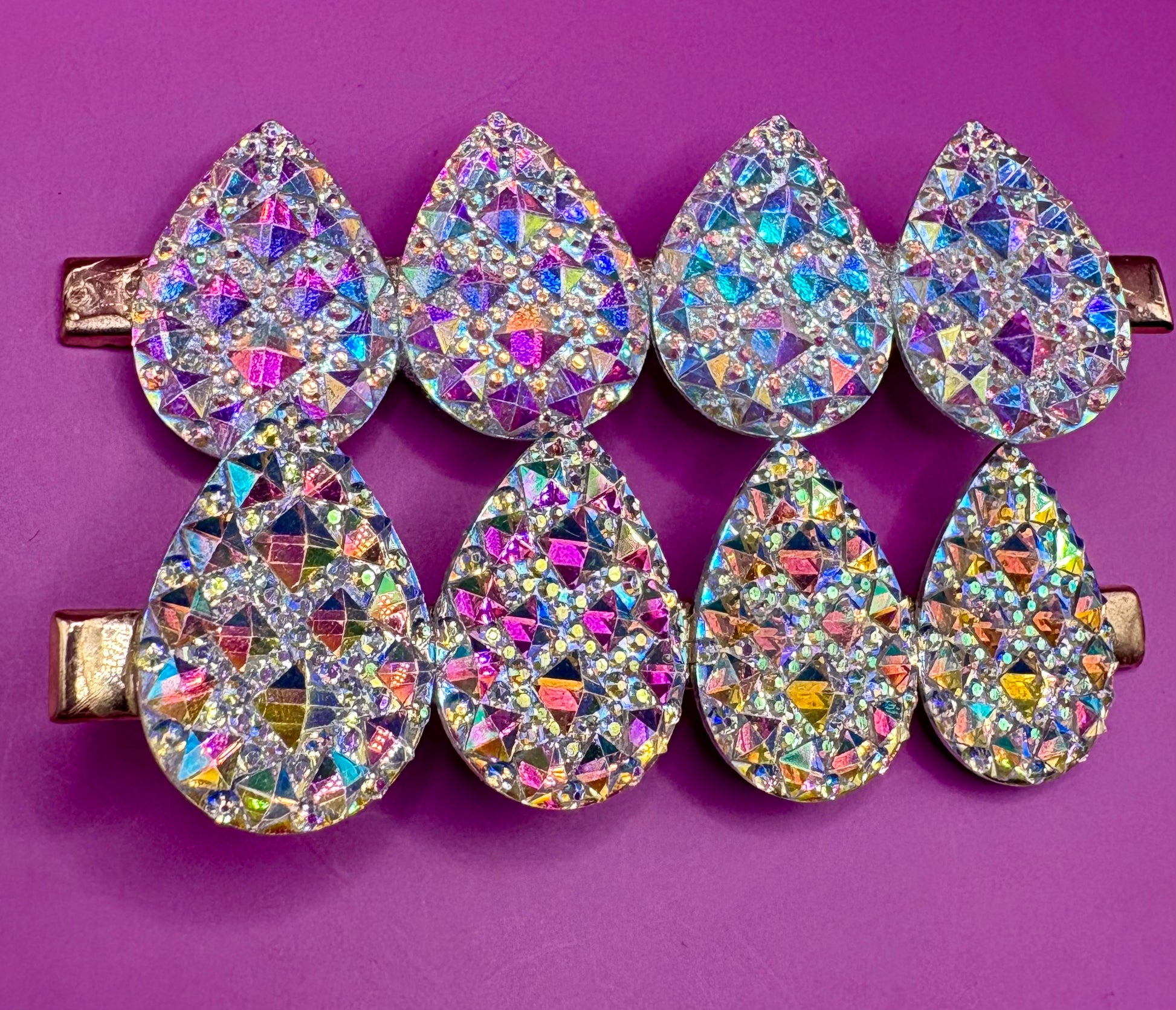 Stylish large circular heart teardrop glitter hair slide in silver, ideal for adding sparkle to festive hairstyles, sold in pairs, perfect for Christmas celebrations.