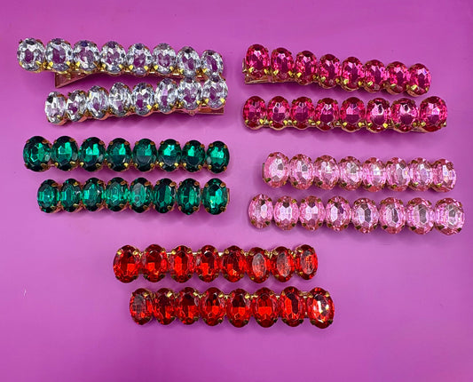 Stylish pair of large gemstone hair slides in vibrant colors, perfect for adding a fashionable touch to any hairstyle and enhancing your look.