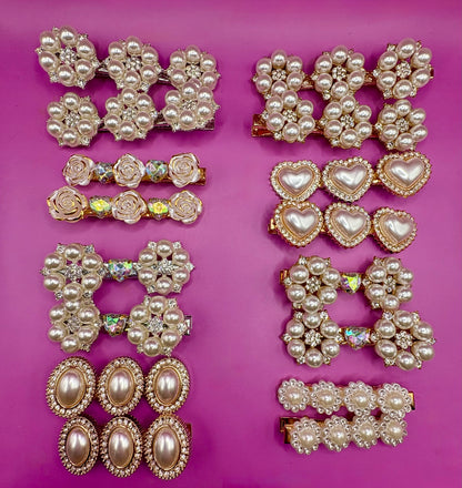 Stylish silver  gold pearlescent hair clip with sparkling pearl accents, perfect for elegant hairstyles and special occasions.