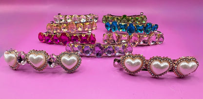 Eye-catching glass rhinestone statement prong clip for hair, perfect for elevating your hairstyle with glamorous sparkle and shine.