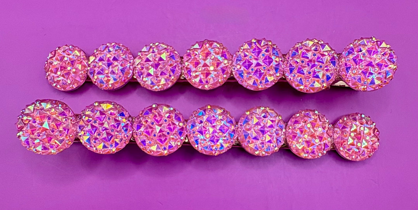 Chic large circular glitter heart hair clips, featuring a sparkly design and sold as a pair, ideal for Valentine's Day gifts and enhancing any hairstyle with a touch of glamour. available in multi colour, gold, turquois pink silver purple