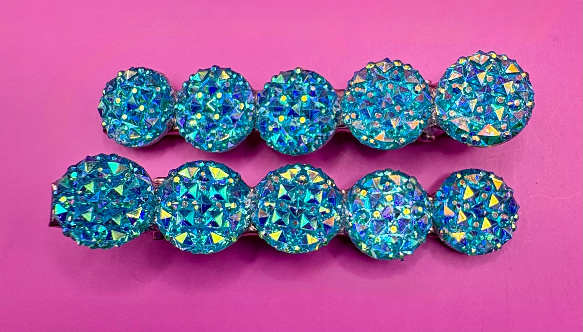 Chic  circular glitter heart hair clips, featuring a sparkly design and sold as a pair, ideal for Valentine's Day gifts and enhancing any hairstyle with a touch of glamour. available in multi colour, gold, turquois pink silver purple