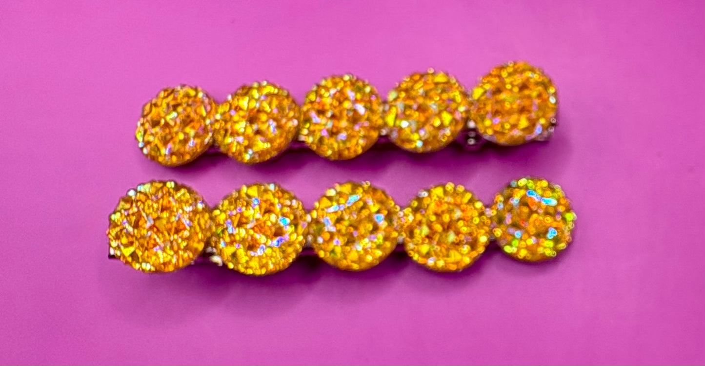 Chic  circular glitter heart hair clips, featuring a sparkly design and sold as a pair, ideal for Valentine's Day gifts and enhancing any hairstyle with a touch of glamour. available in multi colour, gold, turquois pink silver purple