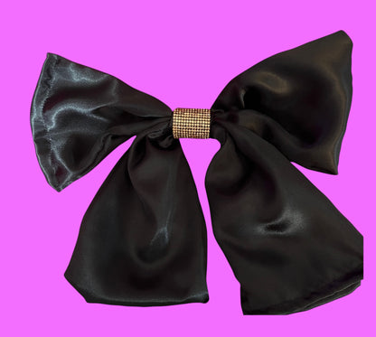 Stylish  hair clip bow in black, ideal for securing hairstyles and adding a chic touch to any look, perfect for both casual and formal occasions.