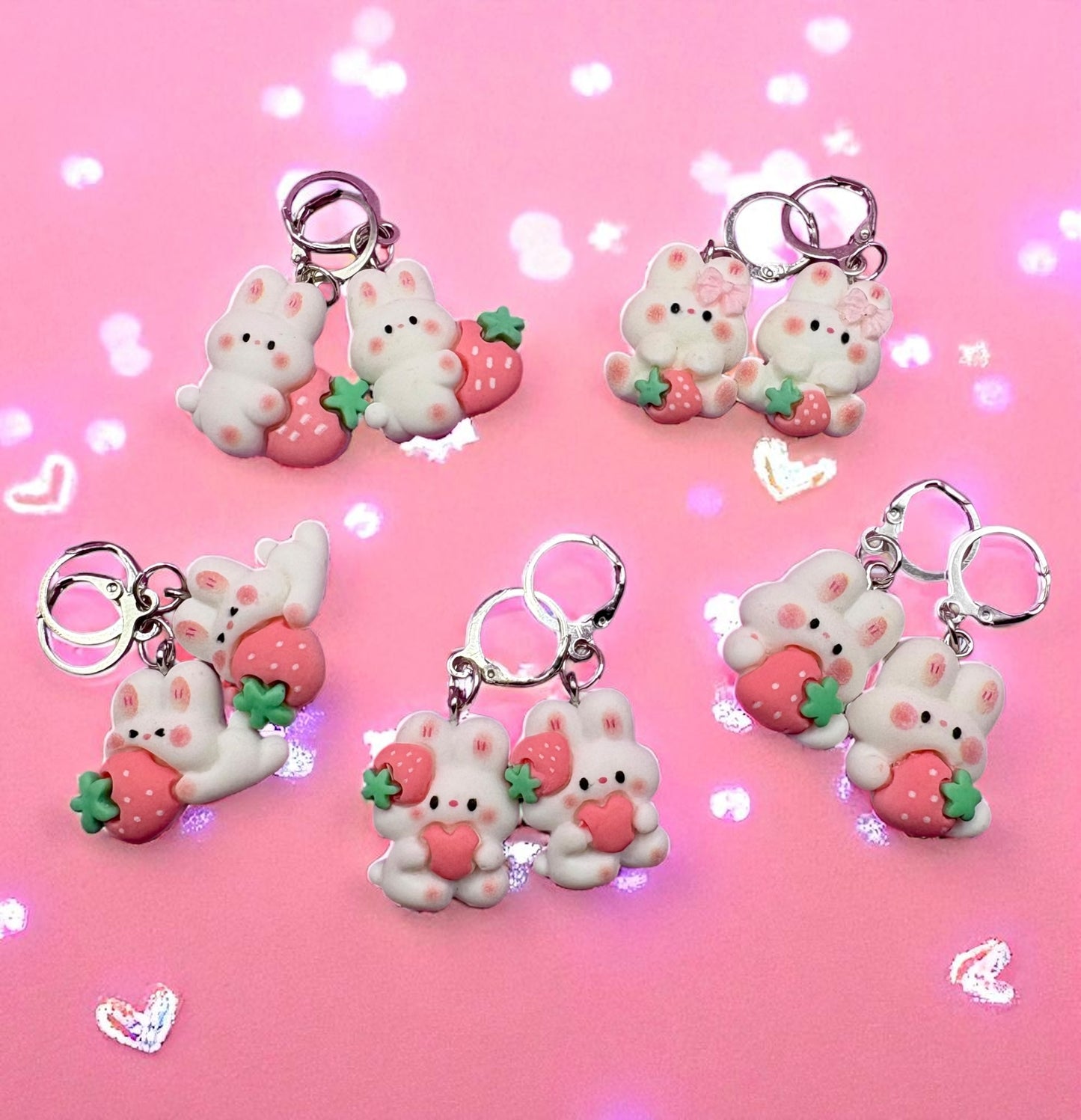 Cute keychains with cartoon characters on a pink background