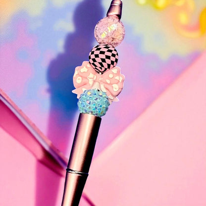 black ballpoint pen with colourful bead accents. stationery lovers Leopard print hearts and bows.