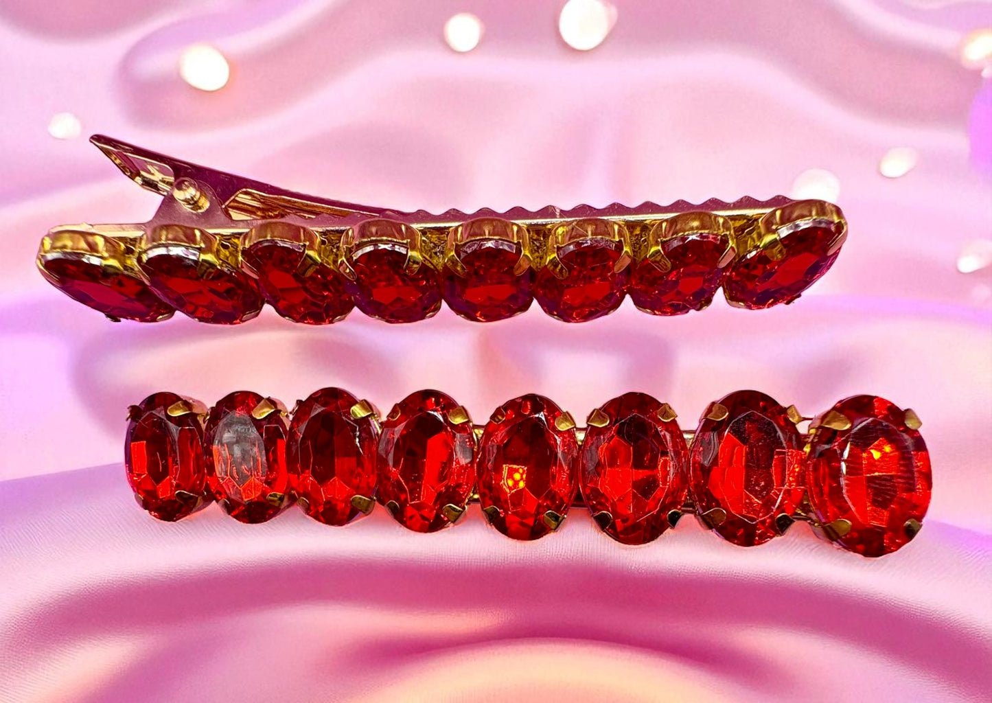 Two red and gold decorative items on a pink background