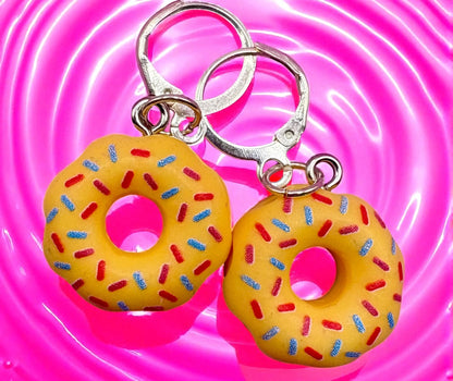 donut earrings, dangly drop earrings pink blue brown white yellow cartoon style novelty earrings