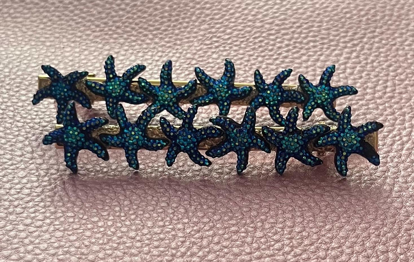 pair of eye catching starfish large 8cm hair clips/slides. available in blue or silver. handmade hair slides.