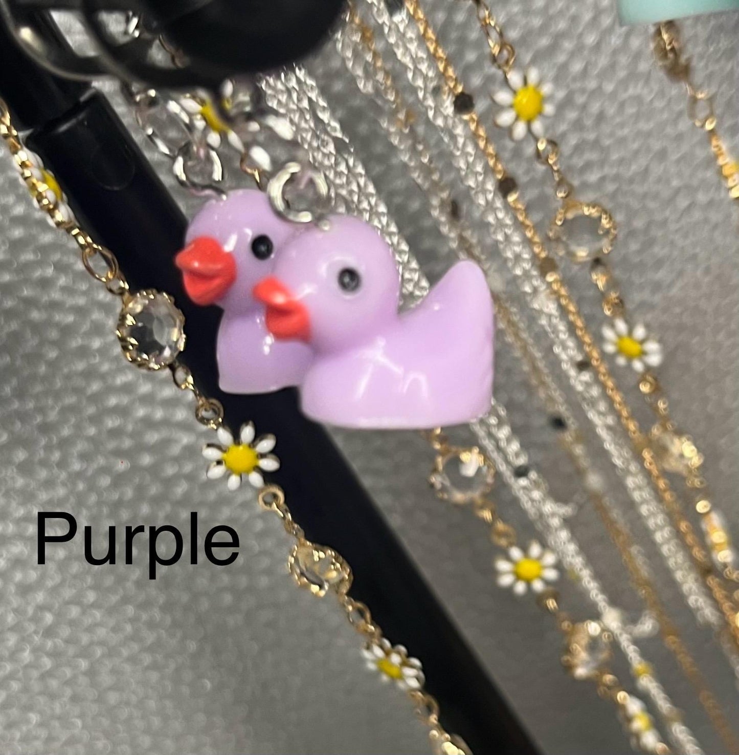 Cute little rubber duck style earrings, dangly drop earrings. available in multiple colours. pink blue yellow purple white costume jewellery