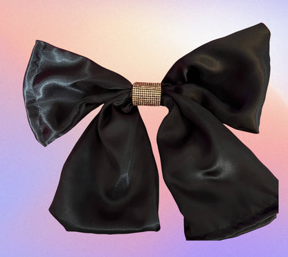 Stylish  hair clip bow in black, ideal for securing hairstyles and adding a chic touch to any look, perfect for both casual and formal occasions.