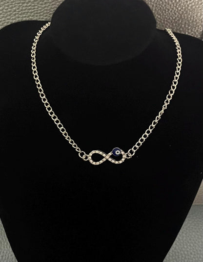 Affinity Rhinestone Evil Eye Necklace featuring a sparkling evil eye charm adorned with rhinestones, symbolizing protection and good fortune, perfect for layering or as a thoughtful gift.