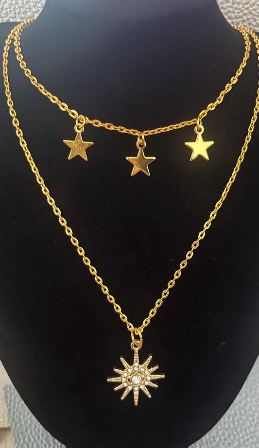 Stylish gold necklace set featuring two delicate necklaces, ideal for layering and adding elegance to any wardrobe for a chic look.