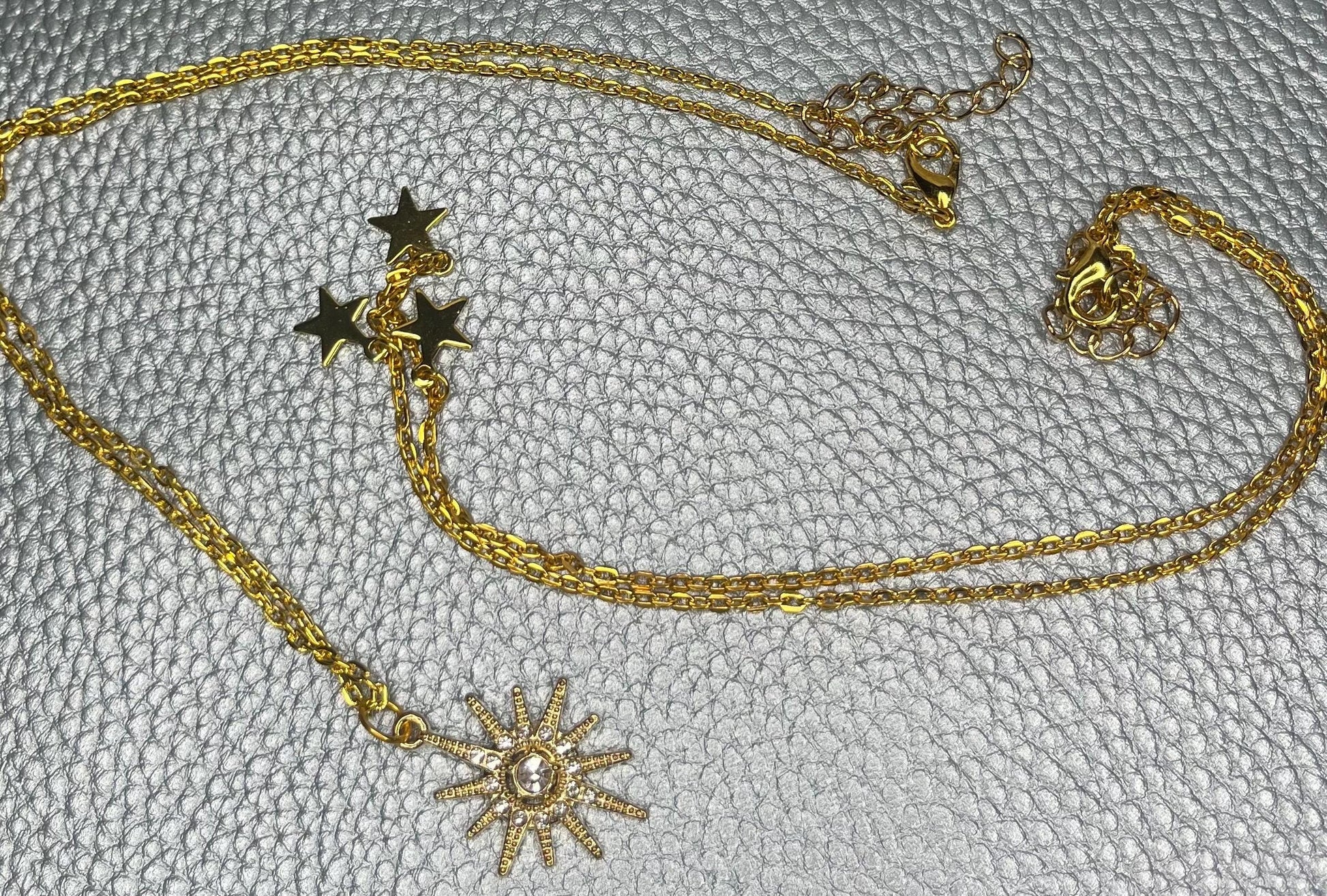 Gold necklace set. two necklaces included. stars diamante stars thin chain bling fashion necklaces