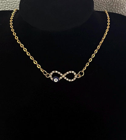 Affinity Diamante Evil Eye Necklace featuring sparkling rhinestones and an elegant design, perfect for adding a touch of glamour and protection to any outfit, ideal for jewelry lovers.