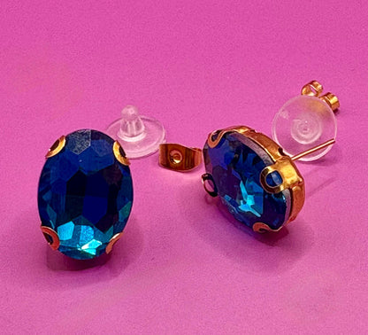 Beautiful elegant blue gemstone earrings in gold, featuring a sophisticated design perfect for weddings, formal events, or enhancing everyday style with a touch of glamour.