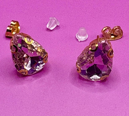 Stunning elegant light pink crystal earrings featuring a delicate design, perfect for special occasions and adding a touch of glamour to any outfit."