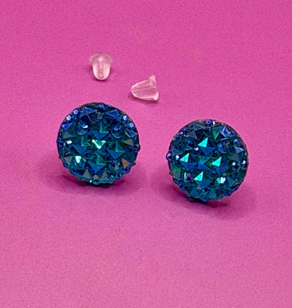 Beautiful dazzling blue stud earrings with sparkling crystals, perfect for adding a pop of color and elegance to any outfit.