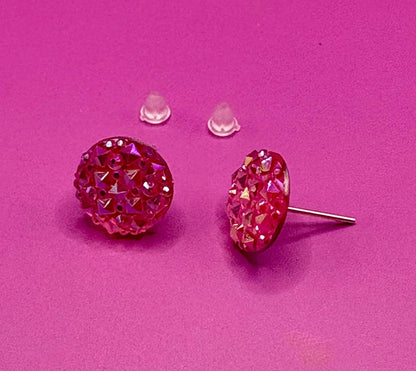 Elegant coral stud earrings featuring shimmering gemstones, ideal for enhancing your jewelry collection and complementing various outfits.