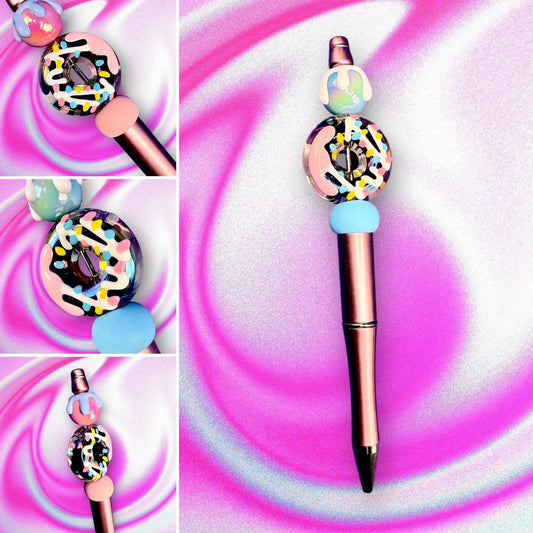 Brighten up your writing routine with our adorable Donut-Themed Black Ballpoint Pen! This whimsical pen features a playful design topped with colorful beads and a delightful donut charm, making it a must-have for anyone who loves unique stationery.