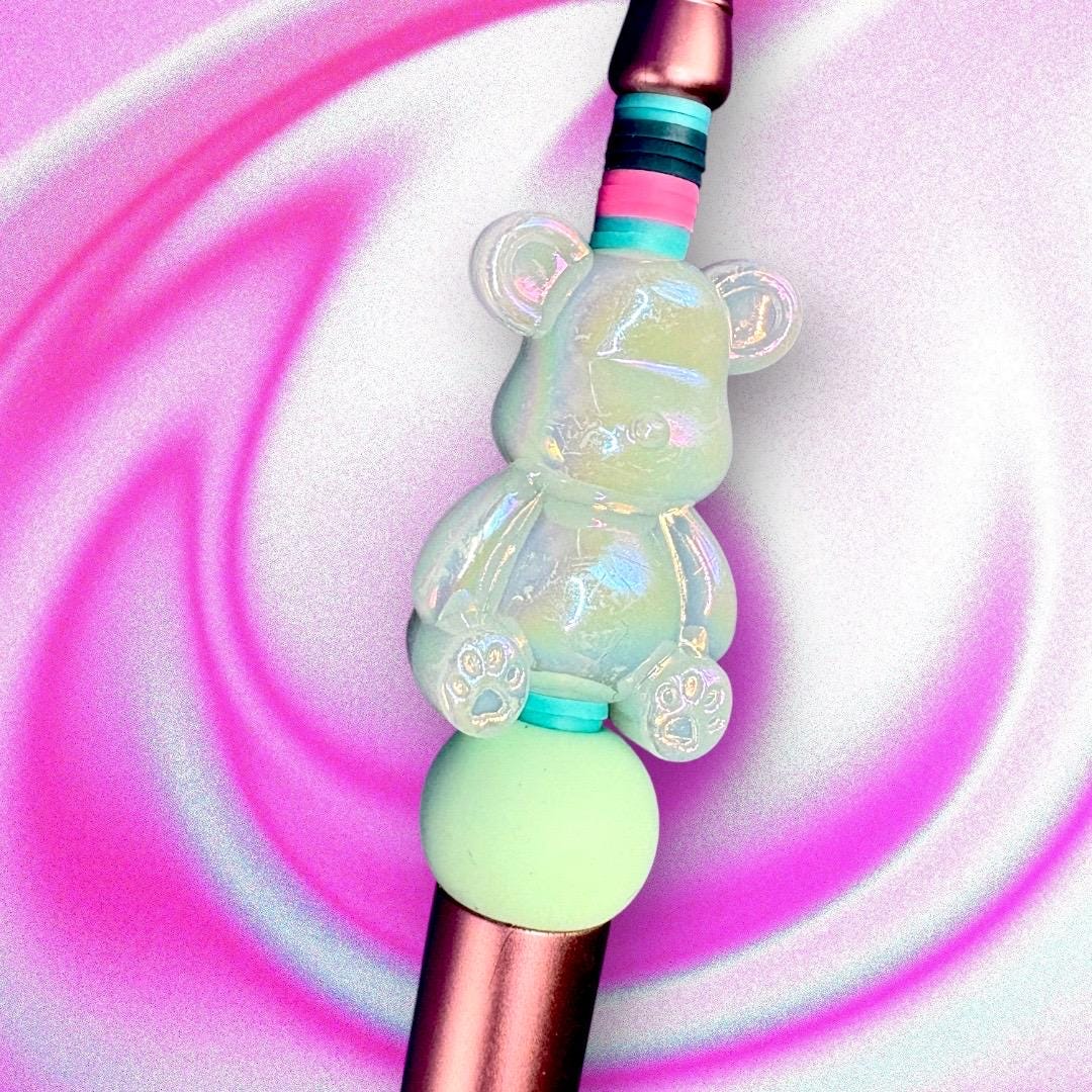 Unleash your creativity with our Charming Gummy Bear-Themed Black Ballpoint Pen! This whimsical writing tool features an adorable gummy bear topper along with vibrant beads, combining functionality with fun in one delightful package