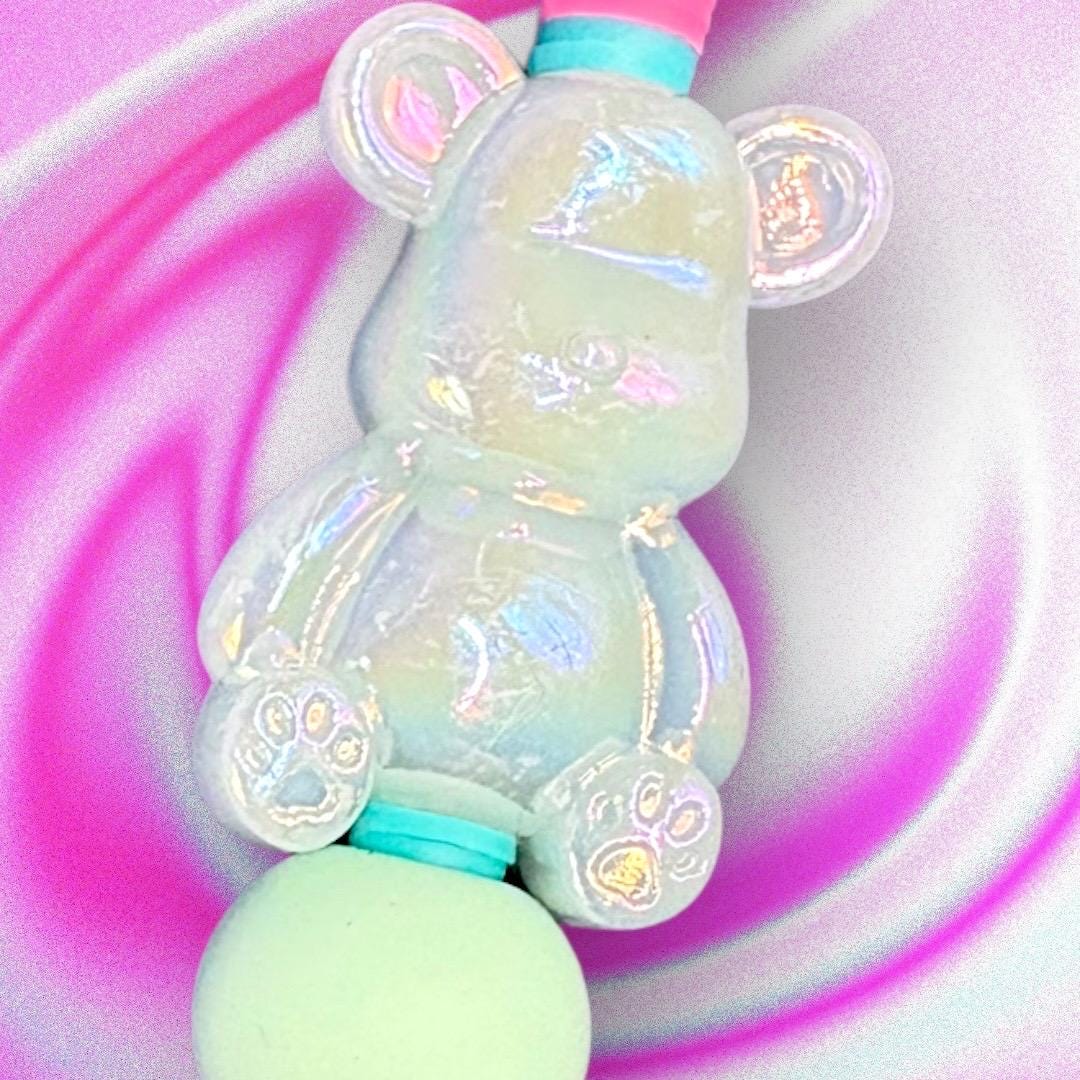 Unleash your creativity with our Charming Gummy Bear-Themed Black Ballpoint Pen! This whimsical writing tool features an adorable gummy bear topper along with vibrant beads, combining functionality with fun in one delightful package