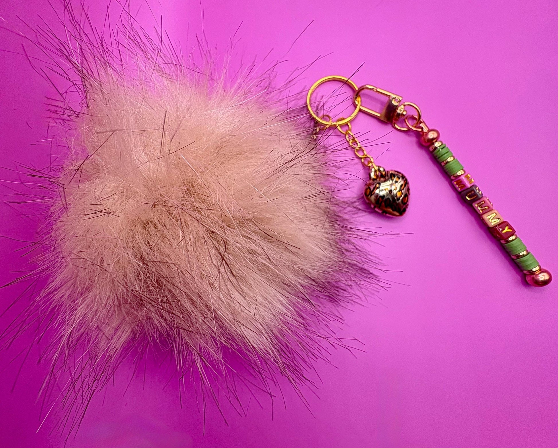bag charm keychain mummy beads with gold leopard print heart pendant and fluffy ball