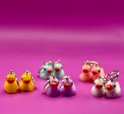 Cute little rubber duck style earrings, dangly drop earrings. available in multiple colours. pink blue yellow purple white costume jewellery