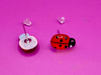 Whimsical red ladybug earrings with charming design, perfect for adding a playful touch to your outfit and ideal for nature lovers and casual wear.