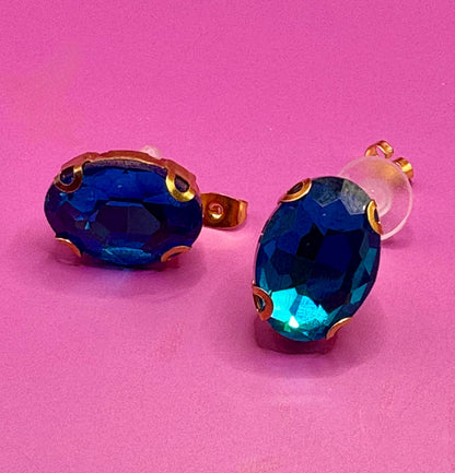 Beautiful elegant blue gemstone earrings in gold, featuring a sophisticated design perfect for weddings, formal events, or enhancing everyday style with a touch of glamour.