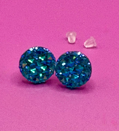 Beautiful dazzling blue stud earrings with sparkling crystals, perfect for adding a pop of color and elegance to any outfit.