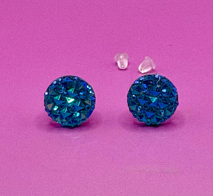 Beautiful dazzling blue stud earrings with sparkling crystals, perfect for adding a pop of color and elegance to any outfit.