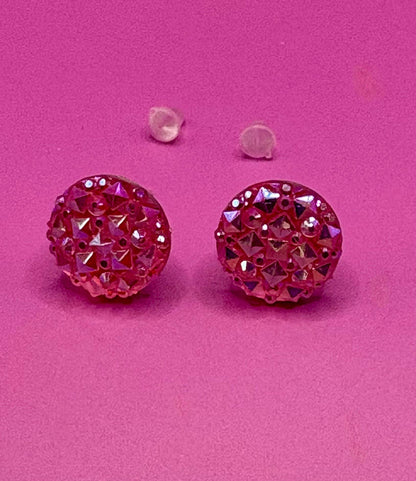 Elegant coral stud earrings featuring shimmering gemstones, ideal for enhancing your jewelry collection and complementing various outfits.