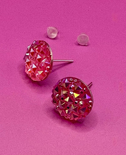 Elegant coral stud earrings featuring shimmering gemstones, ideal for enhancing your jewelry collection and complementing various outfits.