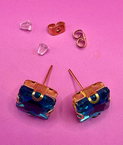 Stunning elegant blue gemstone earrings set in gold, designed for a luxurious look, perfect for special occasions, weddings, or adding sophistication to everyday outfits.