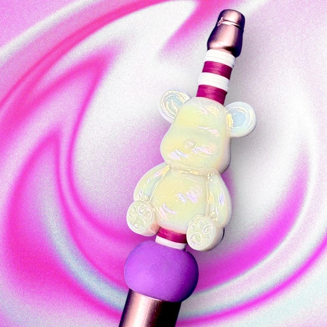 Unleash your creativity with our Charming Gummy Bear-Themed Black Ballpoint Pen! This whimsical writing tool features an adorable gummy bear topper along with vibrant beads, combining functionality with fun in one delightful package