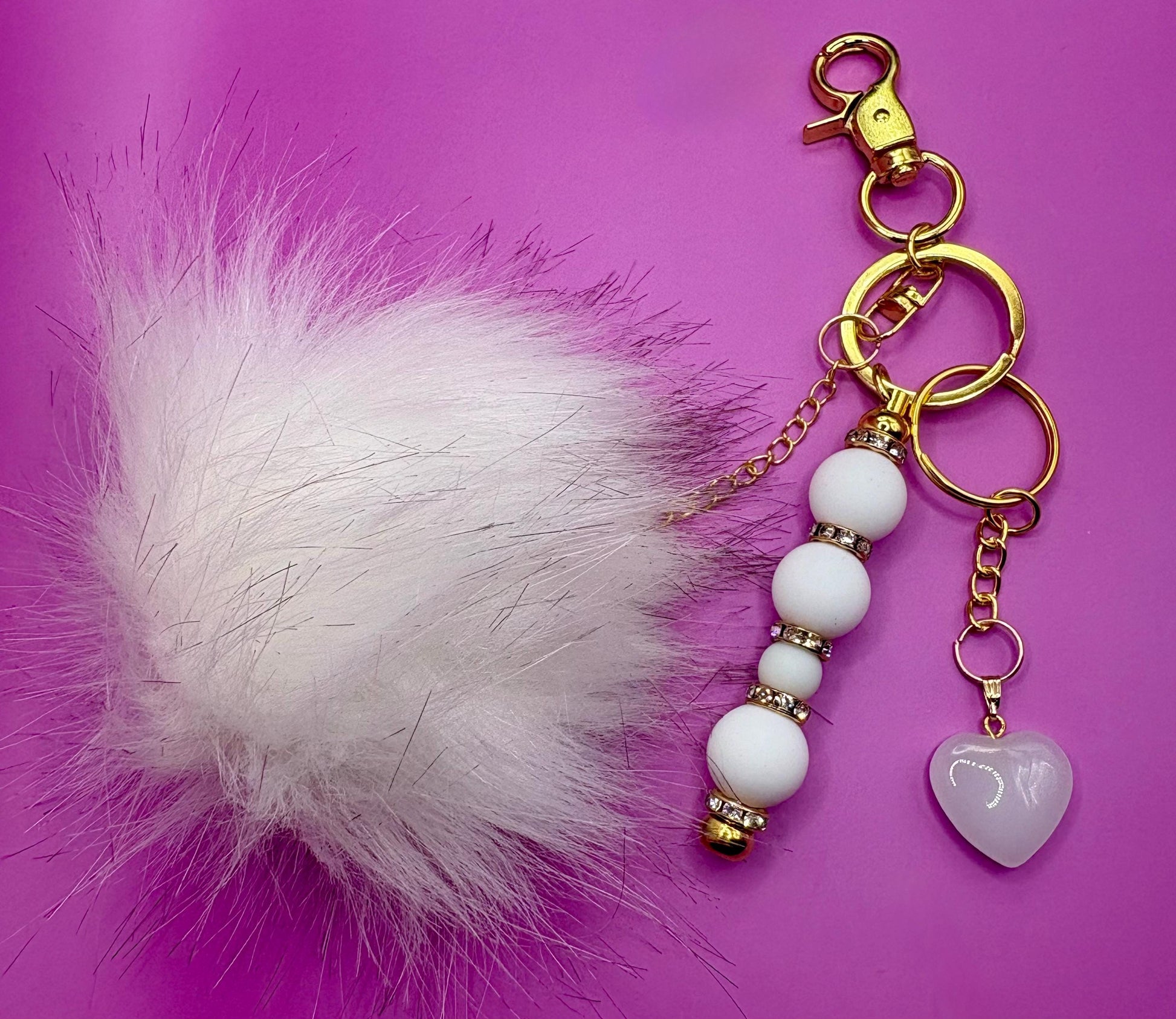 beaded keychain bag charm white beads with gold sparkly spacers heart pendant and fluffy ball
