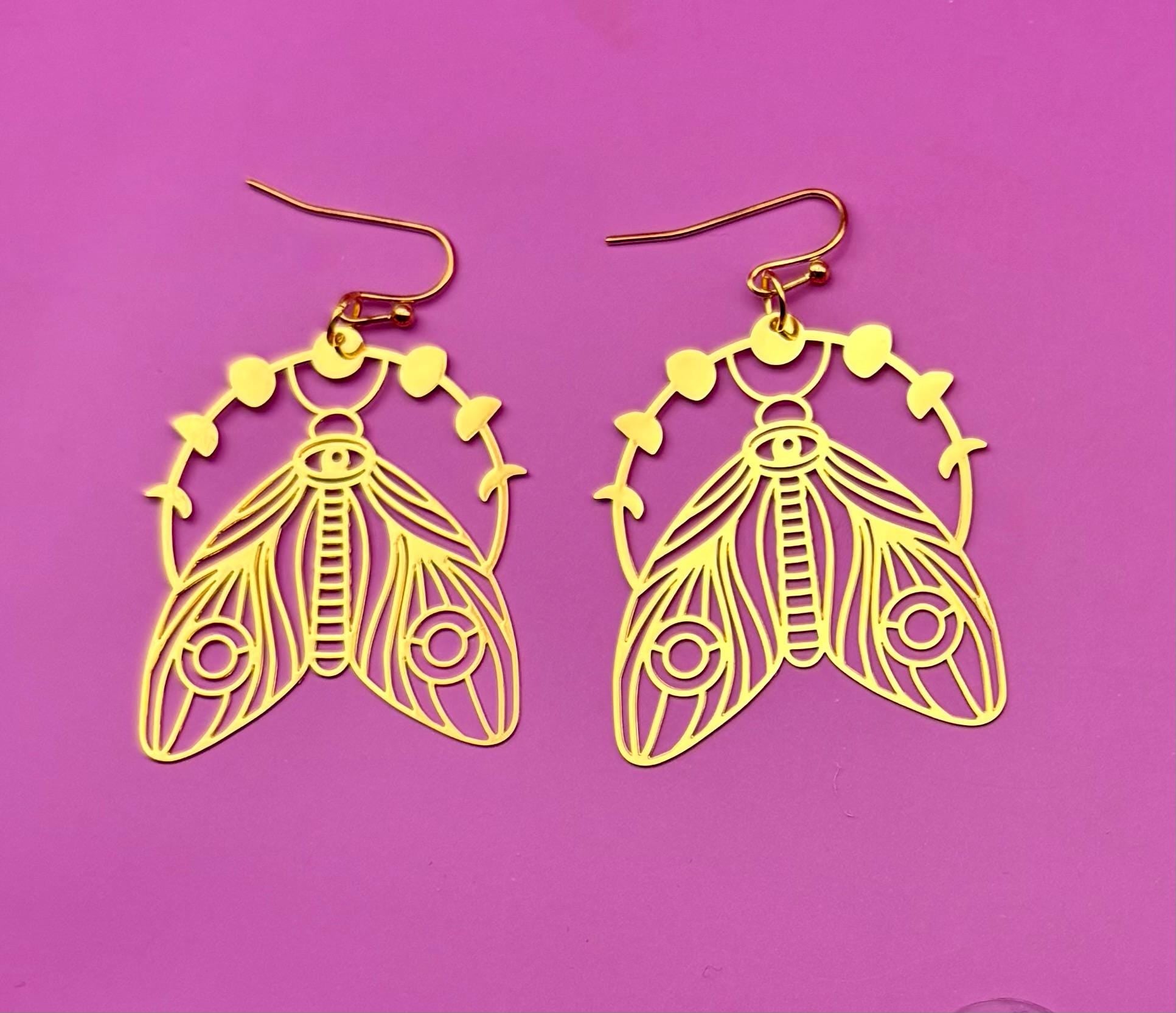 Moth dangly earrings- colour gold